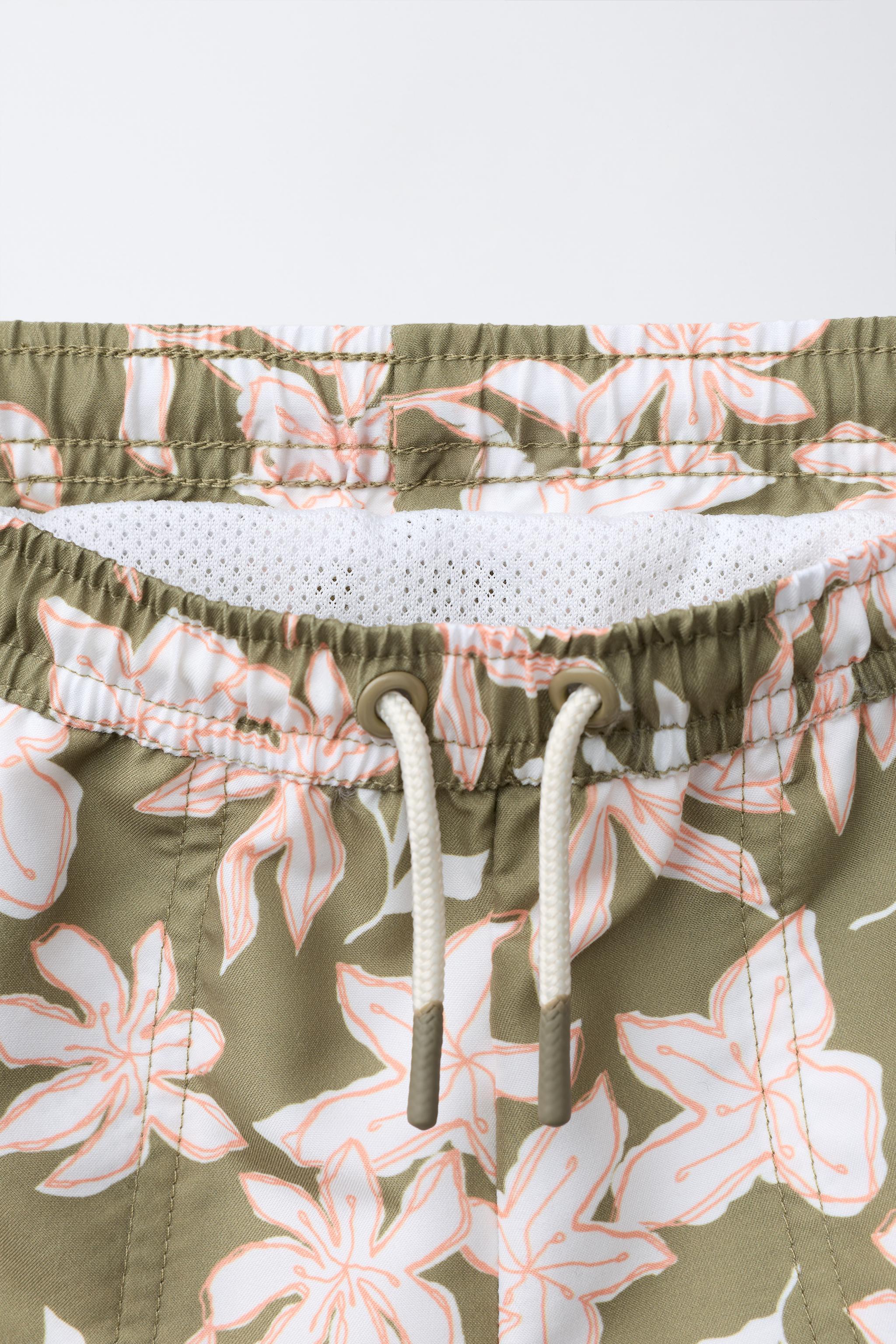 6-14 YEARS / FLORAL SWIM SHORTS